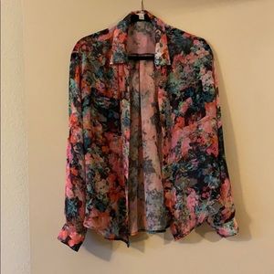 Sheer floral print blouse.